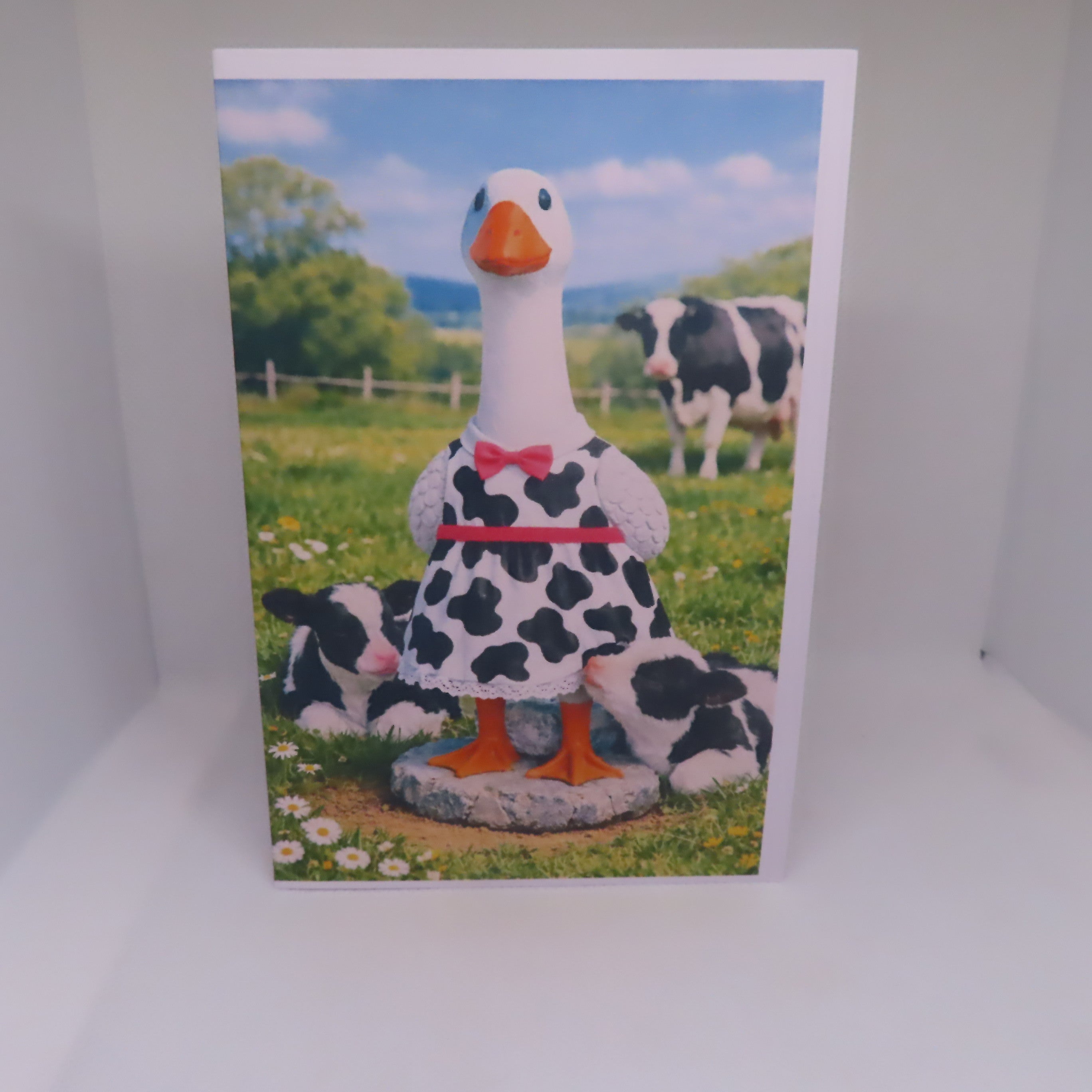 Porch Goose with Cows Greeting Card
